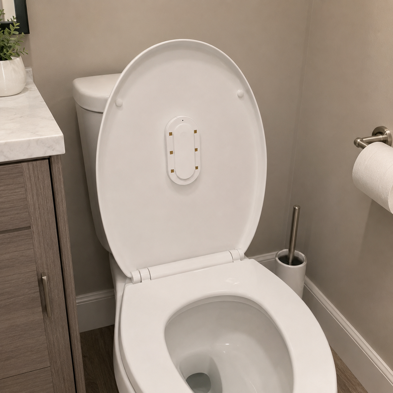 Azuremist mounted inside a shared bathroom toilet lid
